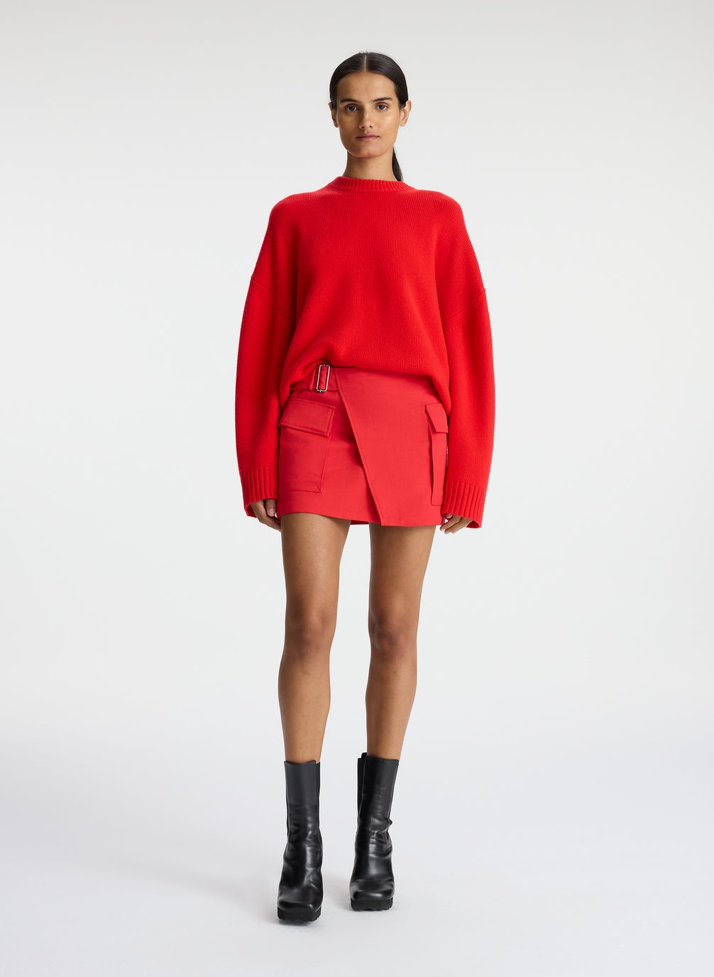 front view of woman wearing red cashmere long sleeve sweater