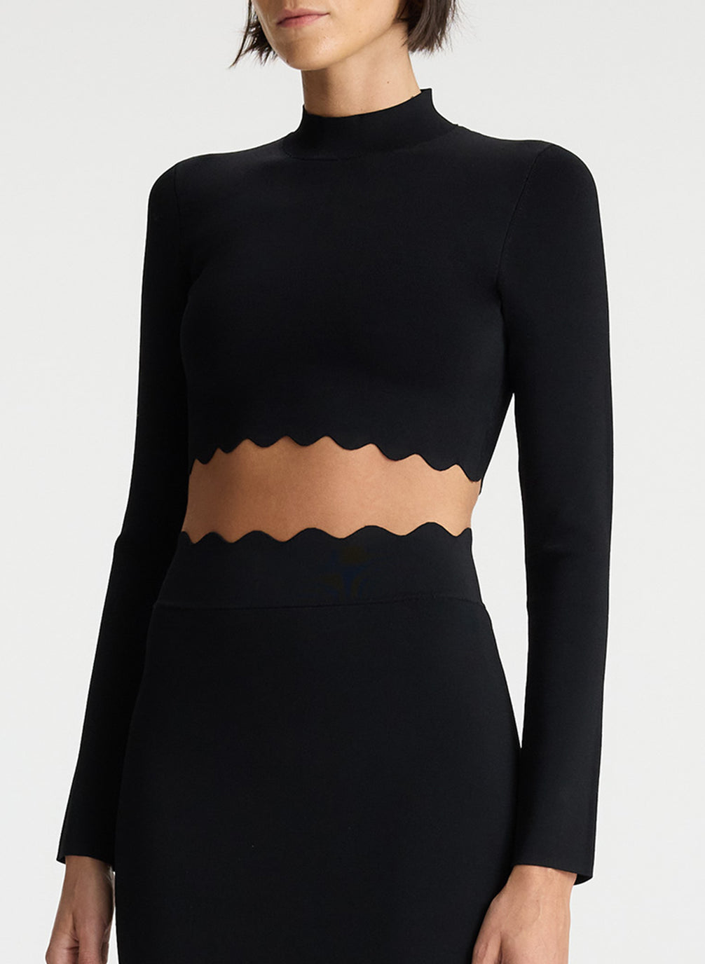 Cropped knit top with scalloped hem Woman, Black