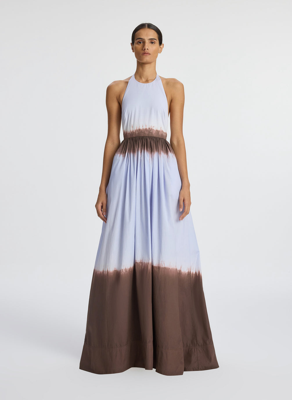 front view of woman wearing dip dye blue and brown sleeveless maxi dress