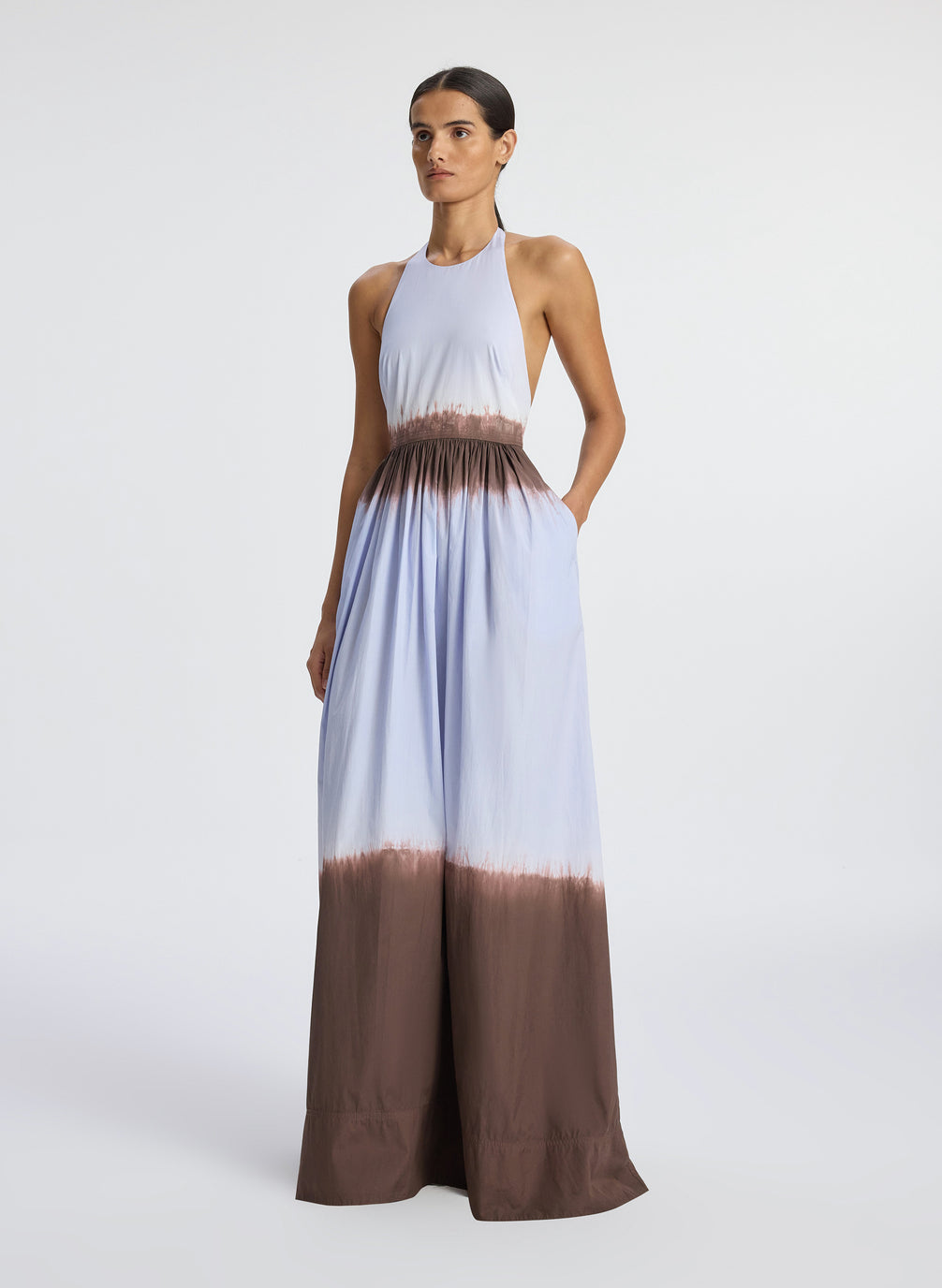 side view of woman wearing dip dye blue and brown sleeveless maxi dress