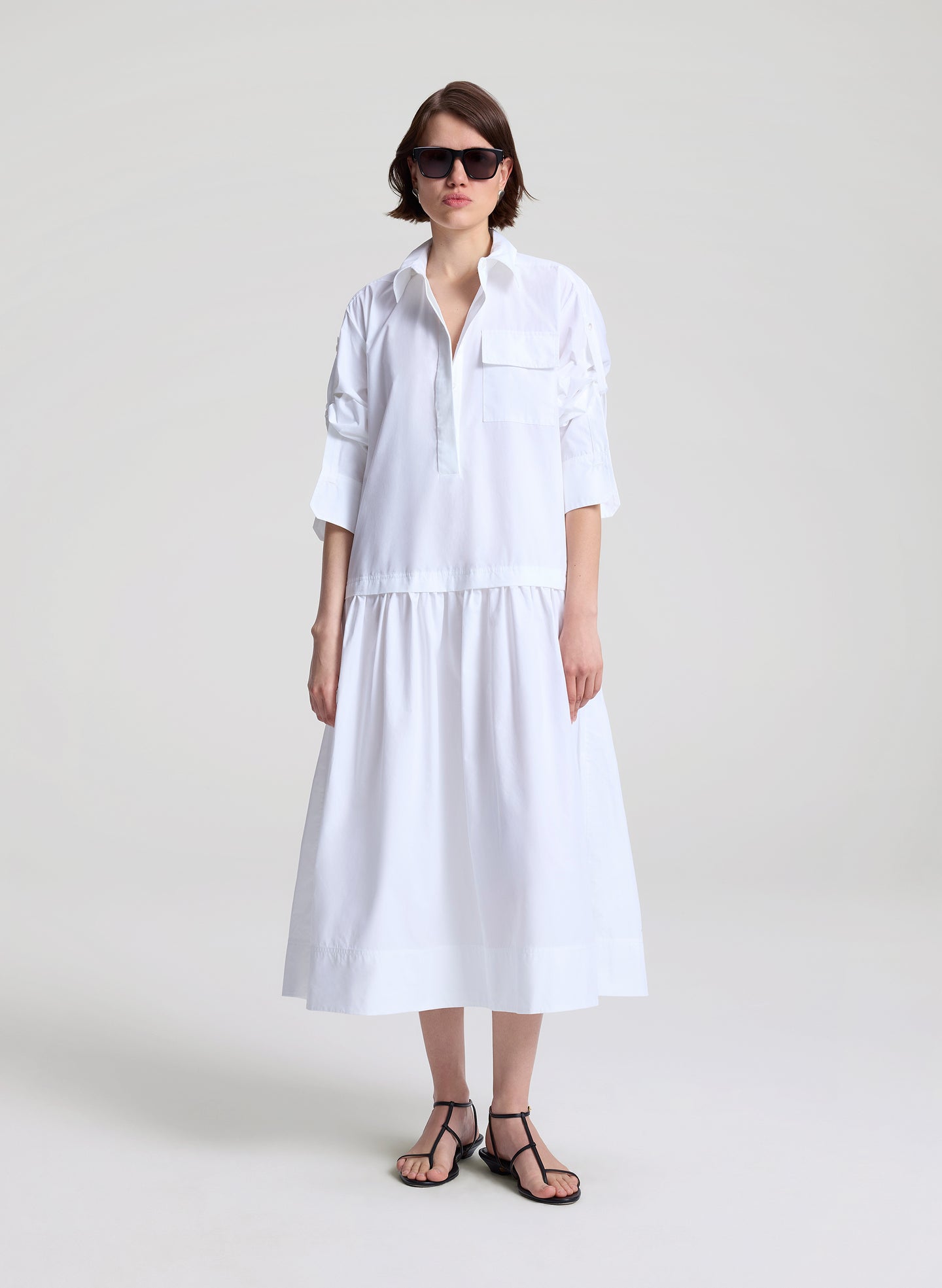 woman wearing white maxi shirtdress