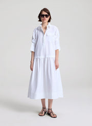 woman wearing white maxi shirtdress