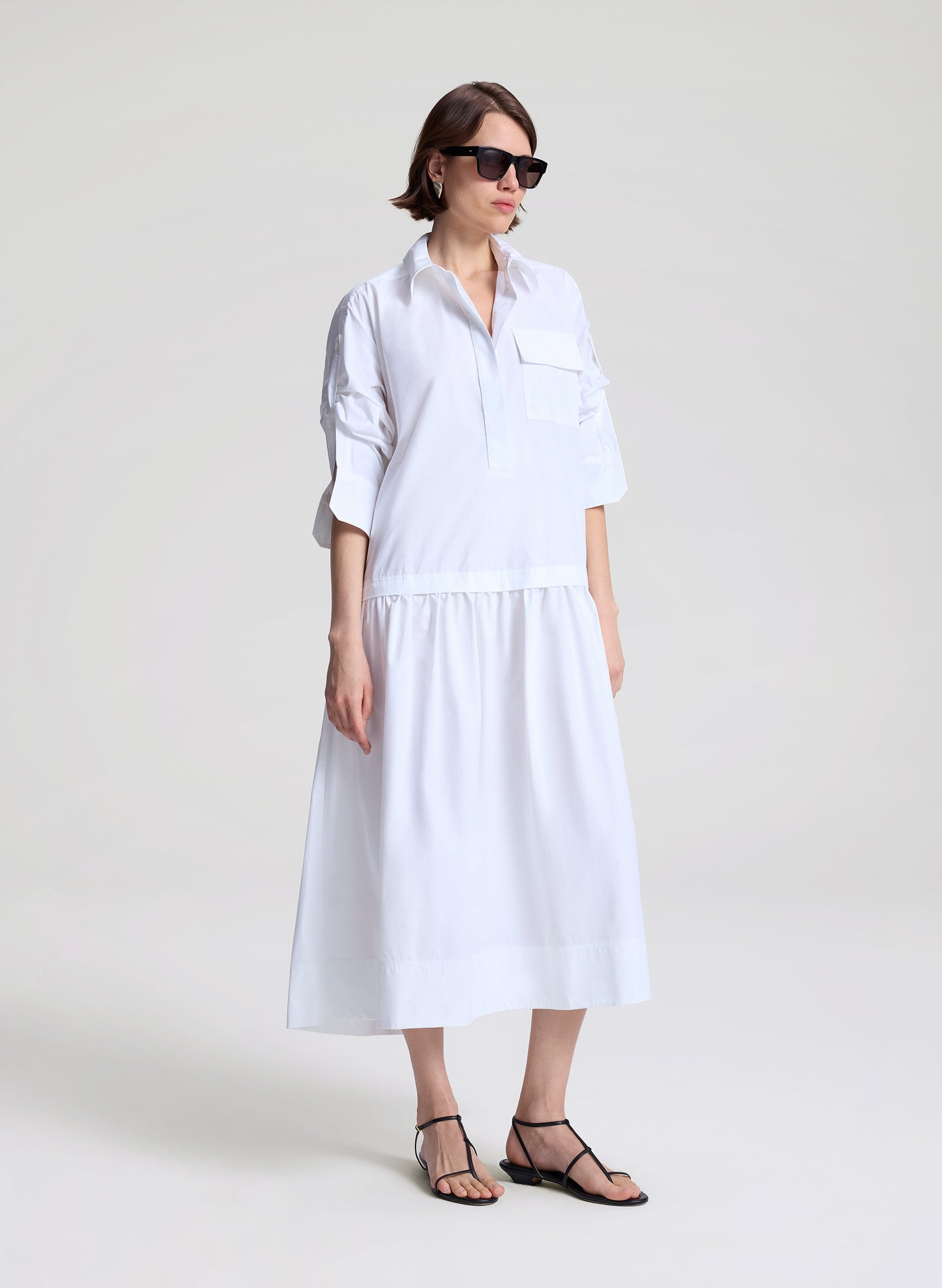 woman wearing white maxi shirtdress