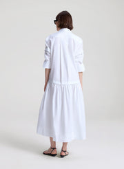 woman wearing white maxi shirtdress