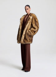 woman wearing faux fur coat