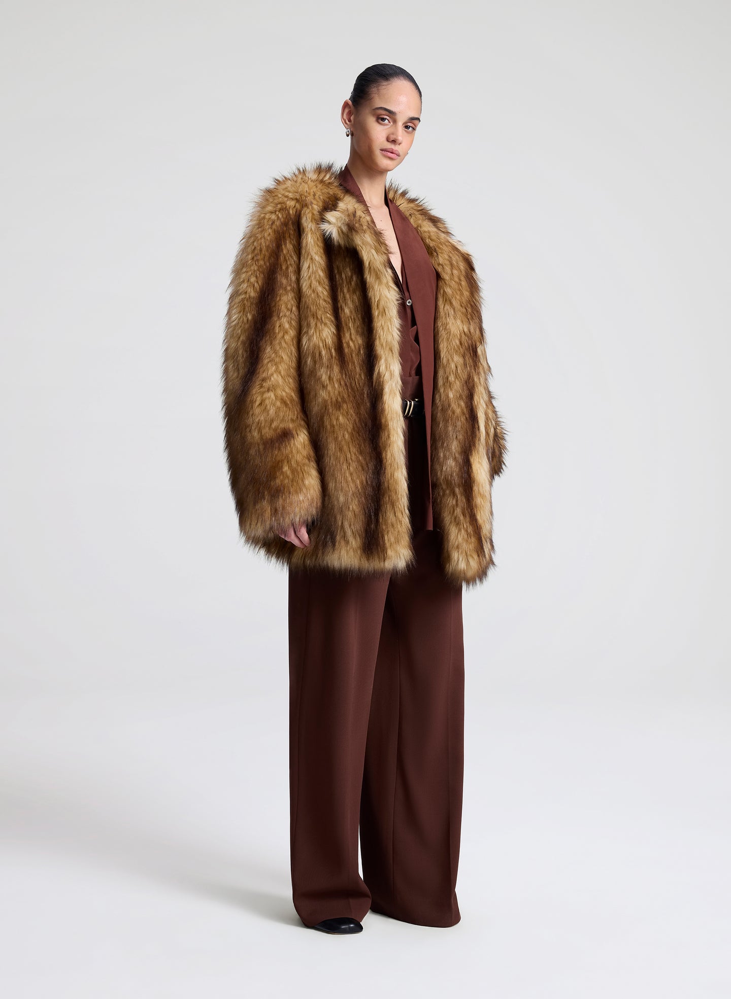 woman wearing faux fur coat