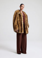woman wearing faux fur coat