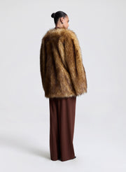 woman wearing faux fur coat