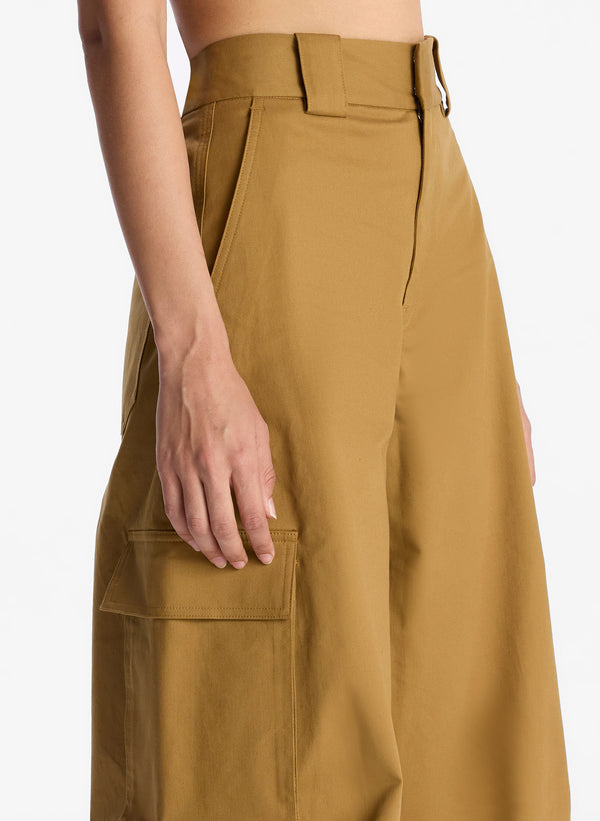 detail view of tan cargo pants on woman