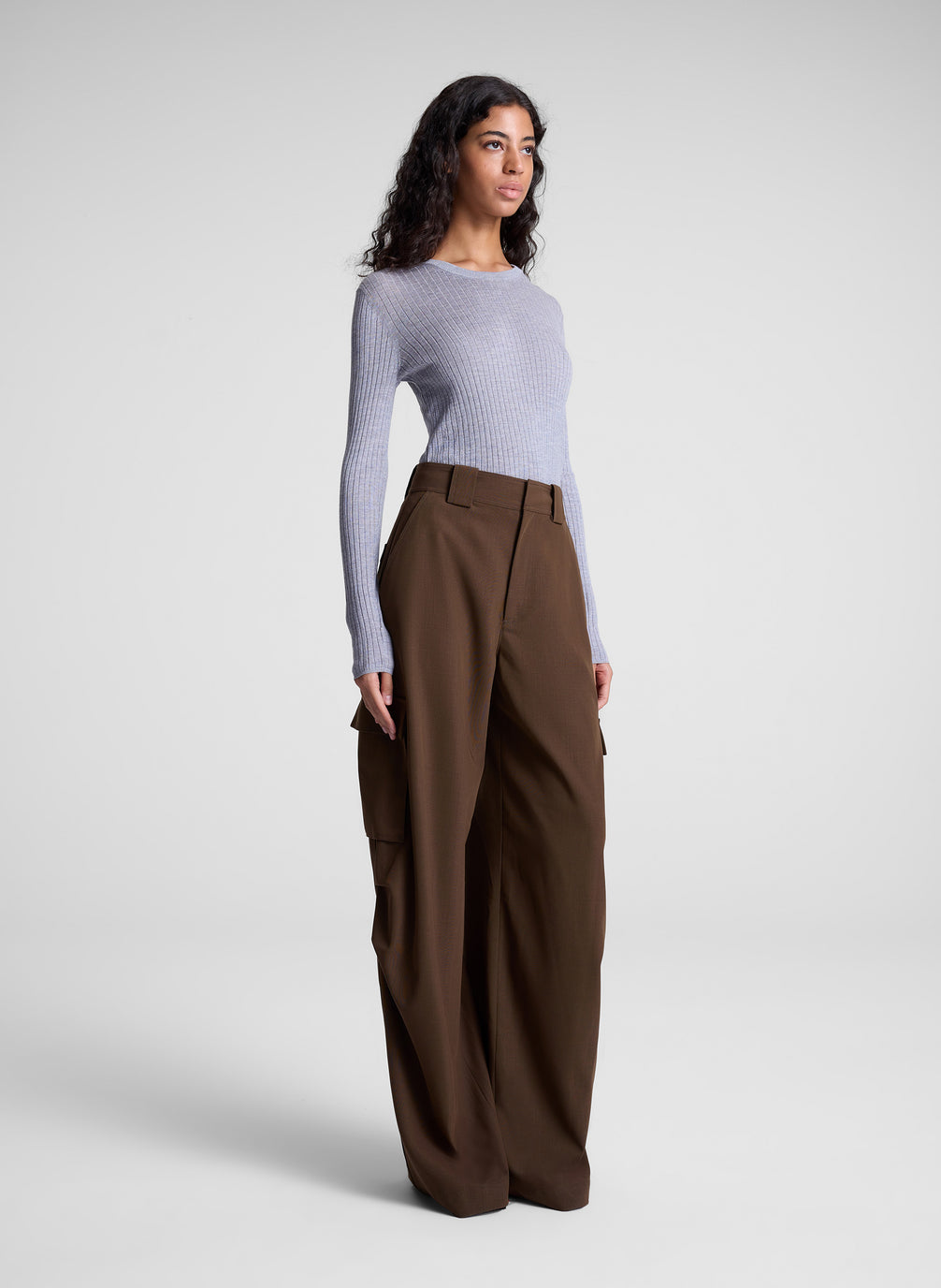 woman wearing grey top and brown cargo pants