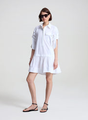 woman wearing white mini shirtdress