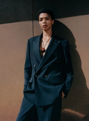 woman wearing navy blue suit