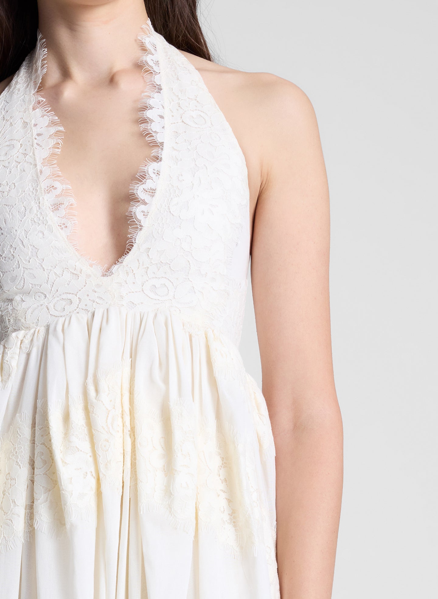 woman wearing cream lace dress