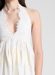 woman wearing cream lace dress