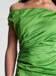 woman wearing green off shoulder midi dress