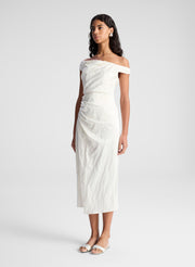 woman wearing whit off shoulder midi dress