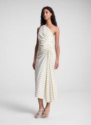 woman wearing yellow striped one shoulder dress
