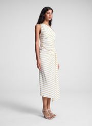 woman wearing yellow striped one shoulder dress