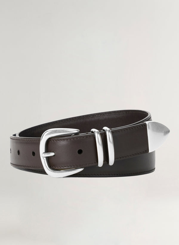 Brown leather belt with silver buckle on a light gray background