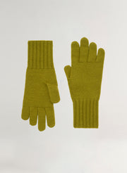 Pair of green gloves on a white background