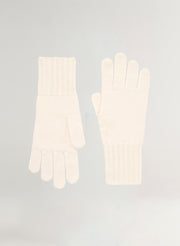 Pair of white gloves on a light gray background