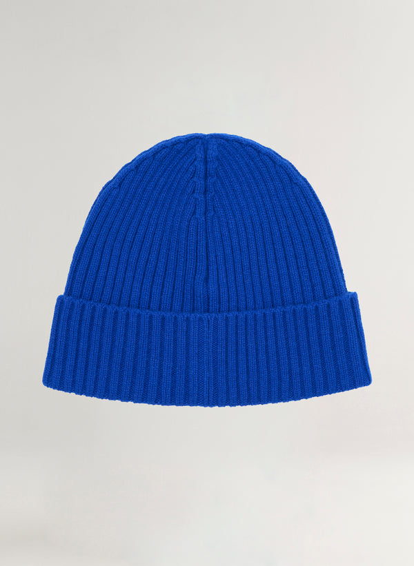Blue beanie on a light gray background
