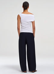 woman wearing white off shoulder tee and pants