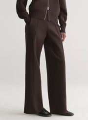 woman wearing brown zip cardigan and matching knit pant