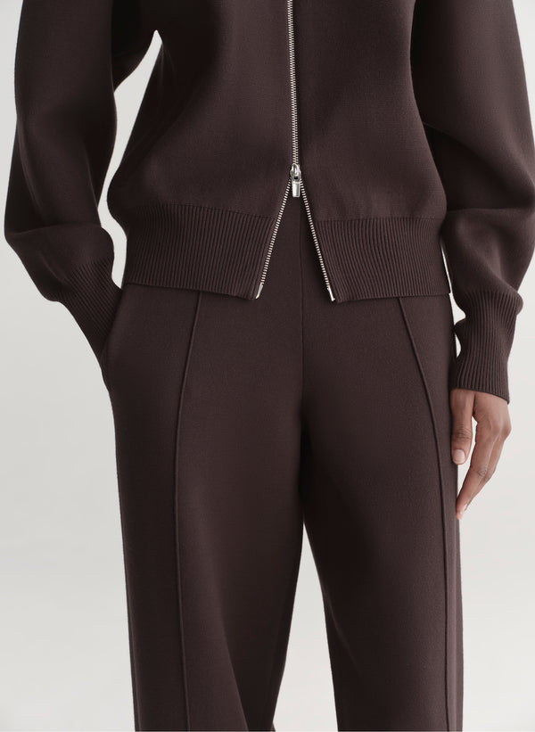 woman wearing brown zip cardigan and matching knit pant