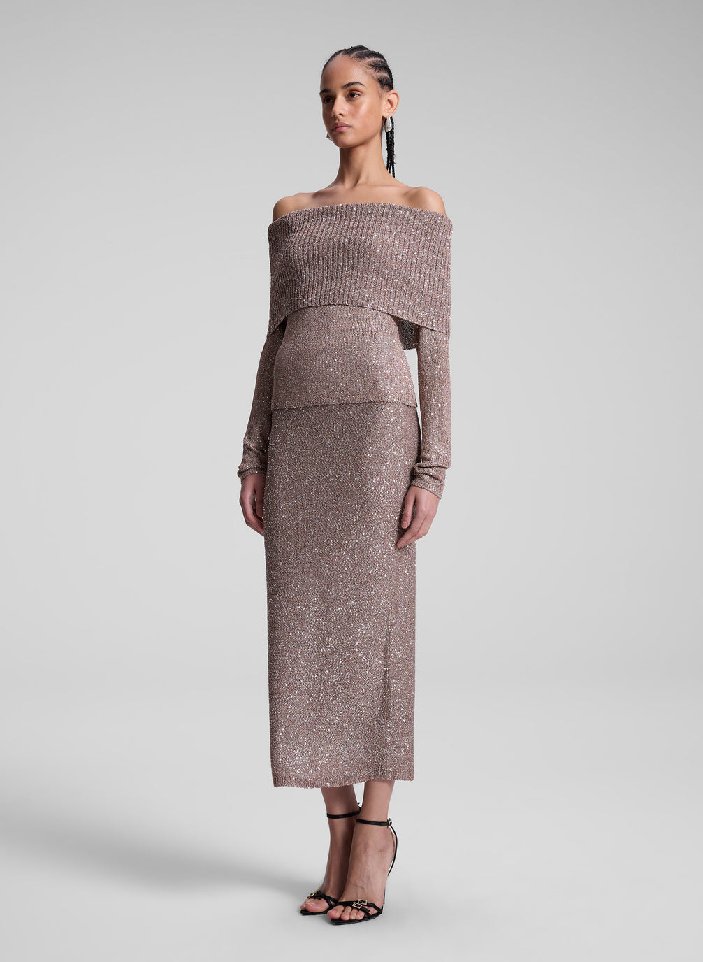 woman wearing mauve sweater top and skirt set