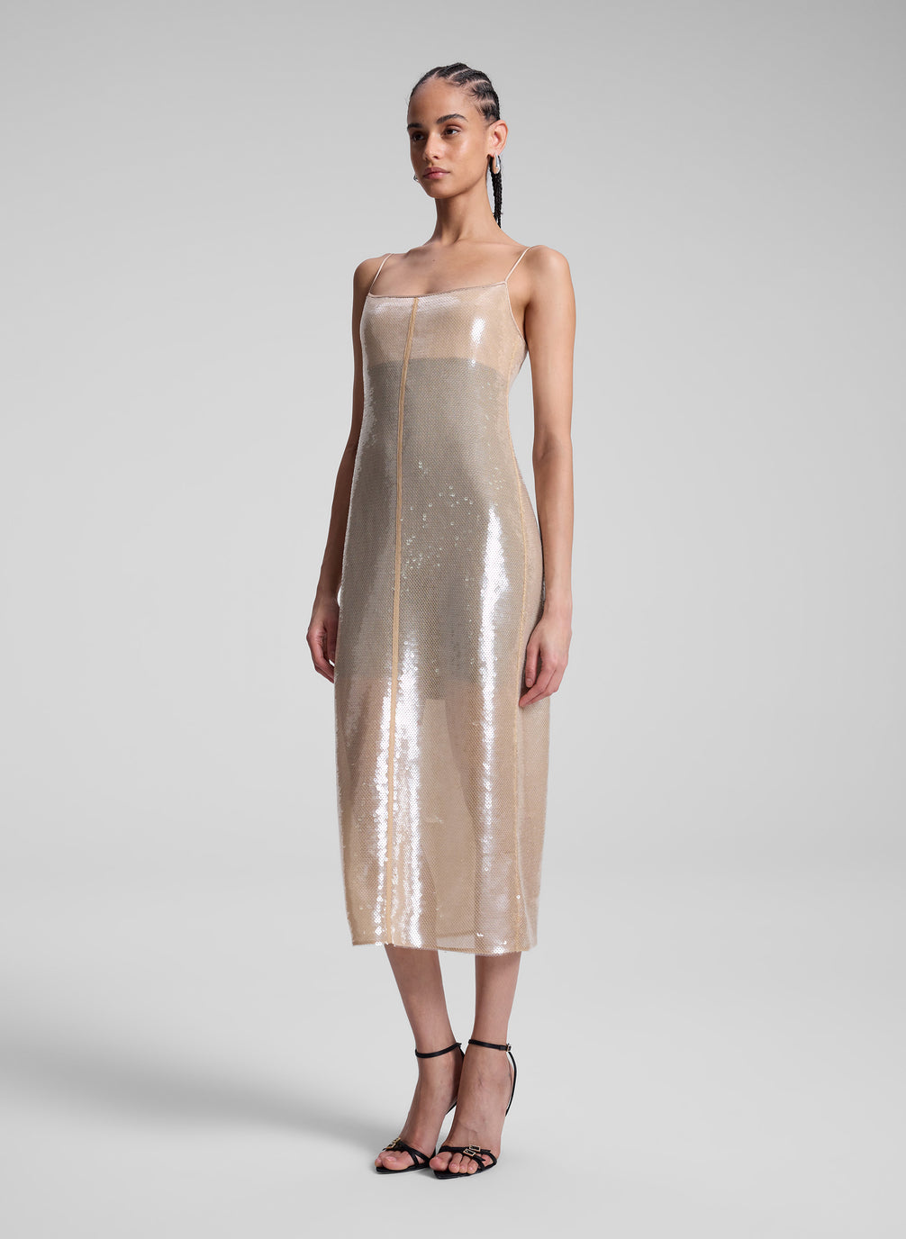 woman wearing cream sequin dress