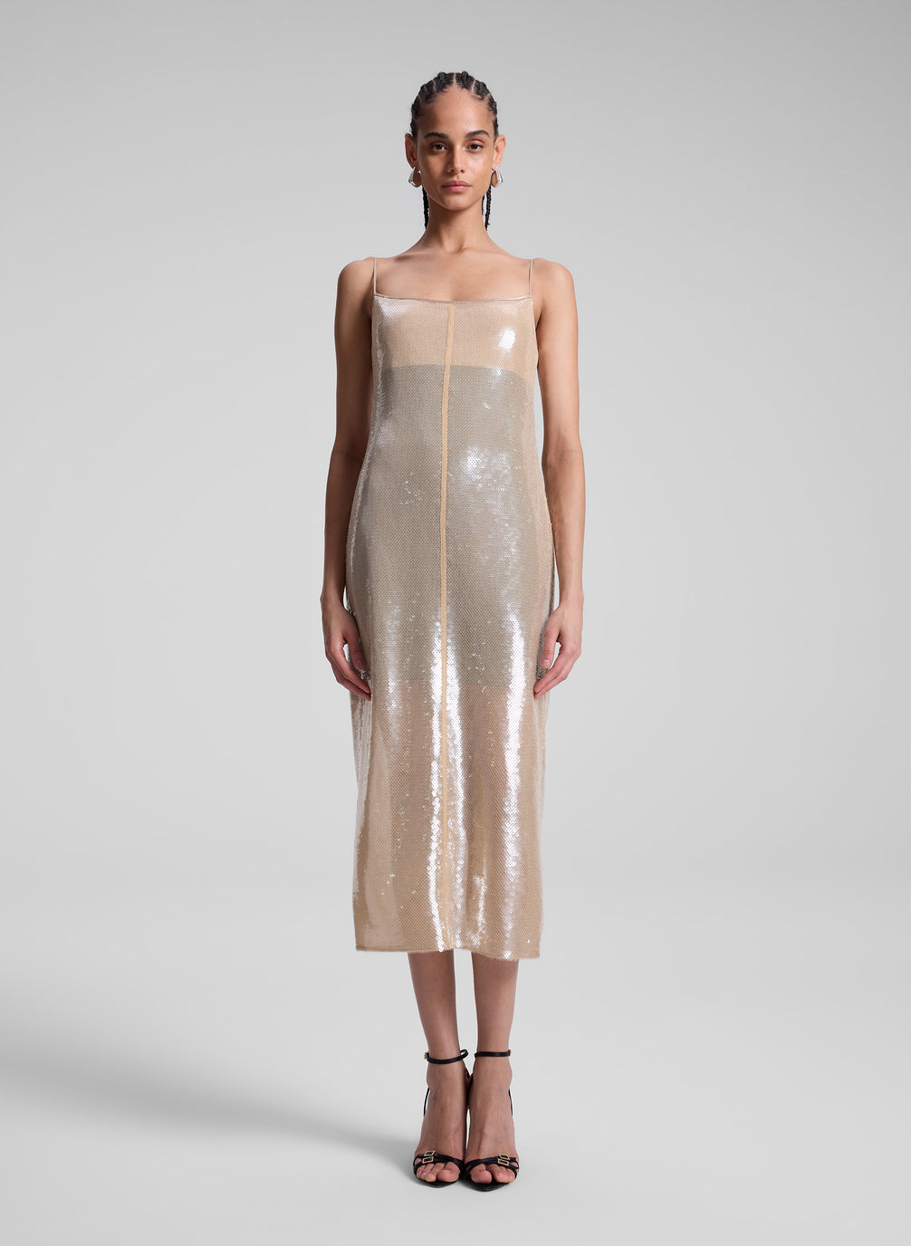 woman wearing cream sequin dress