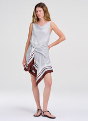 woman in scarf print dress