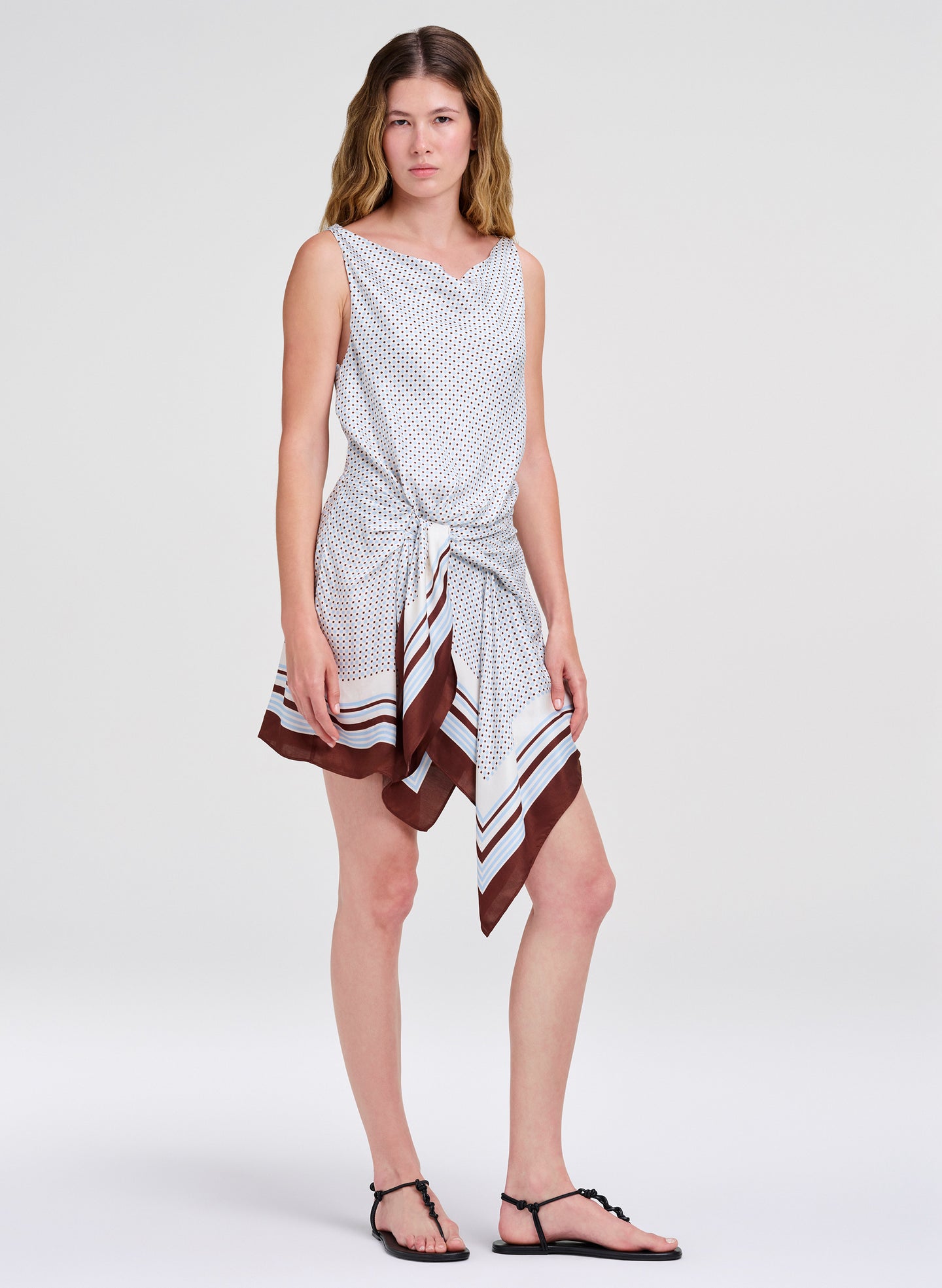 woman in draped mini dress
