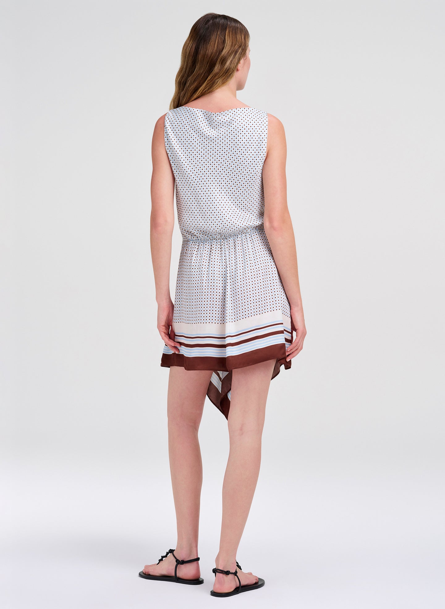 woman in patterned mini dress