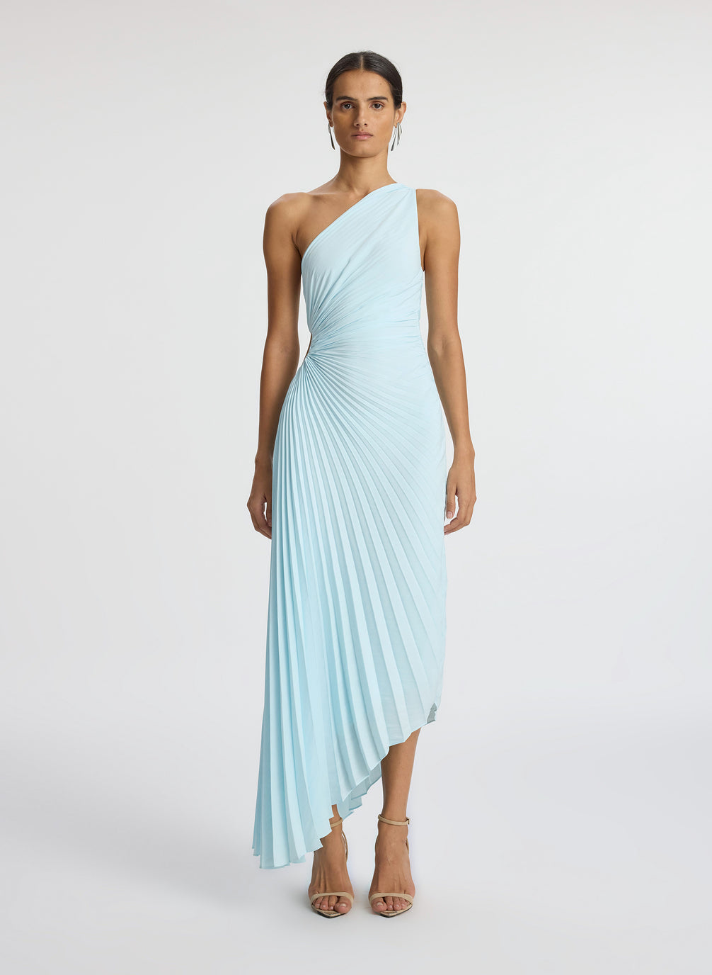 front view of woman wearing aqua pleated one shoulder dress