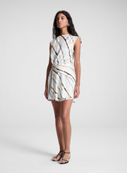 woman wearing striped mini dress