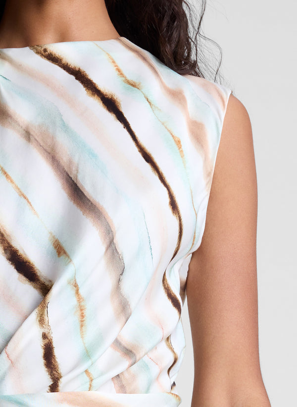 woman wearing striped mini dress