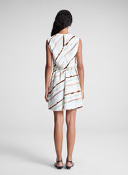 woman wearing striped mini dress