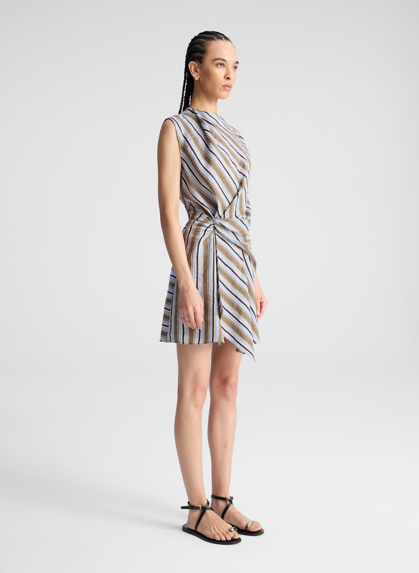 woman wearing striped mini dress