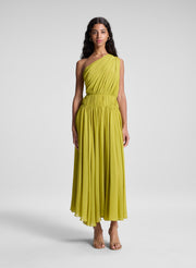 woman wearing green one shoulder midi dress