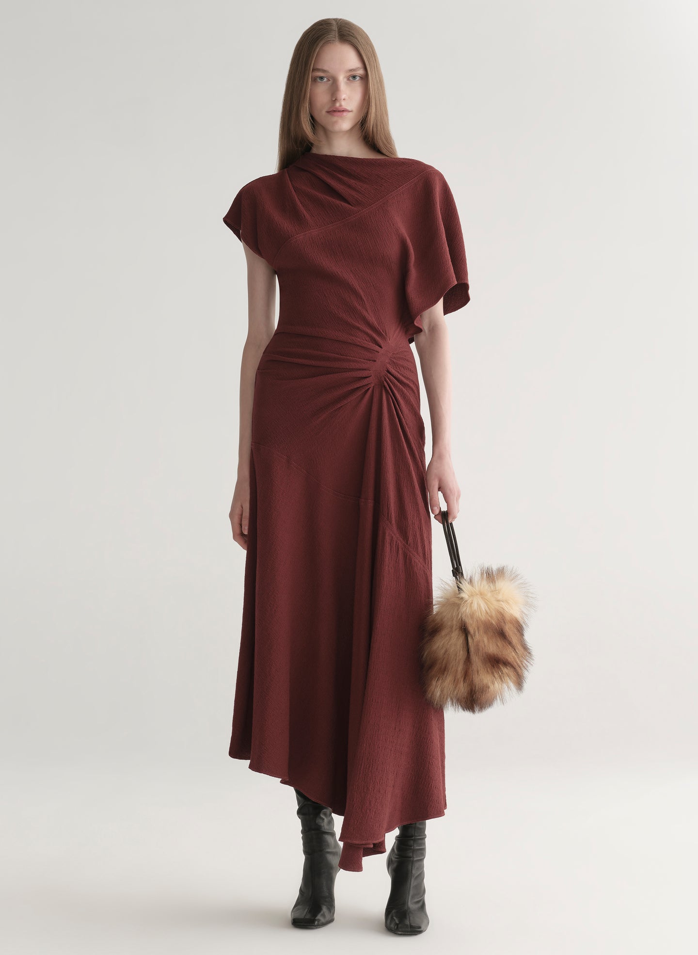 Woman wearing a burgundy dress 