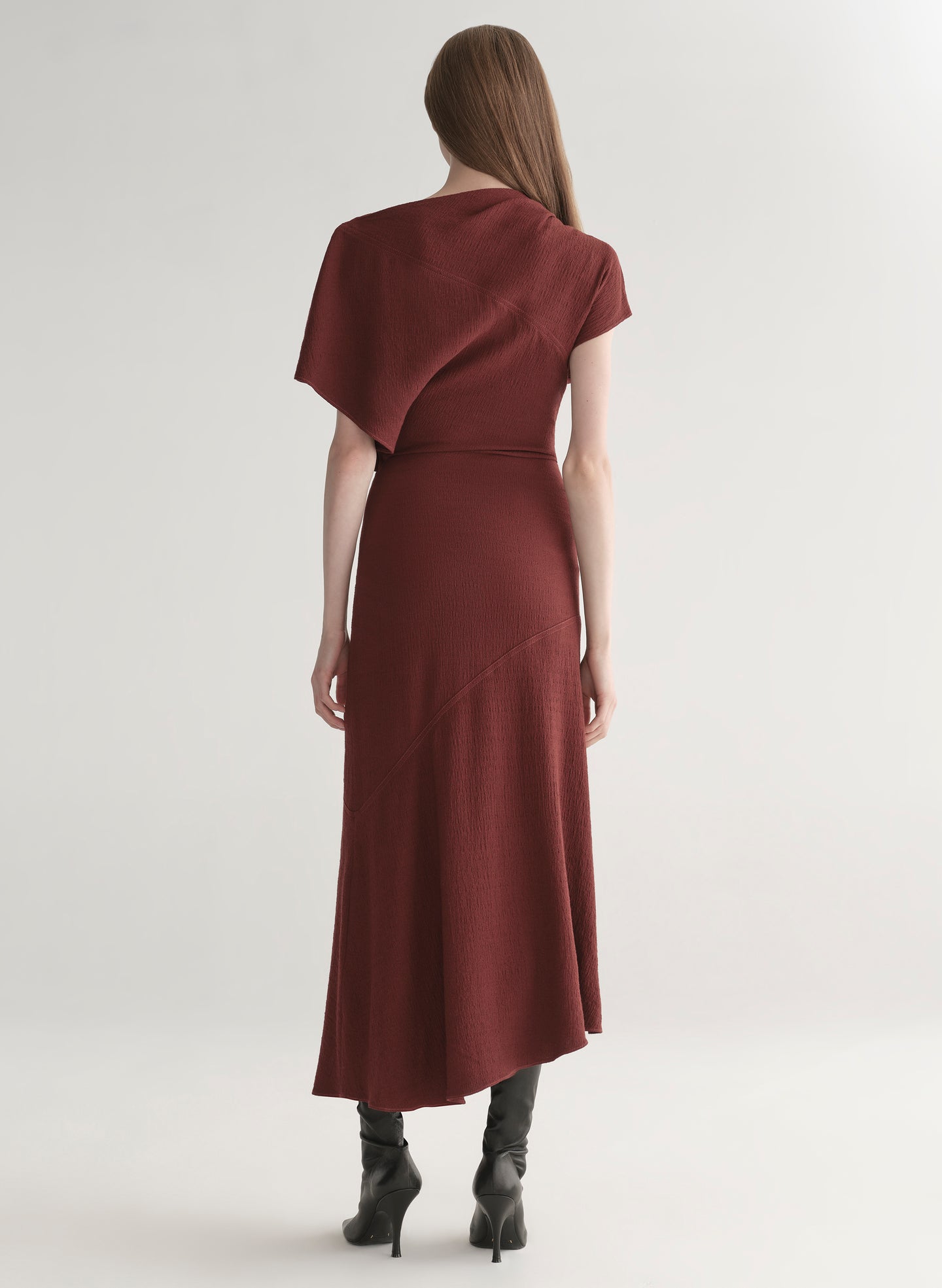 Woman wearing a burgundy dress 