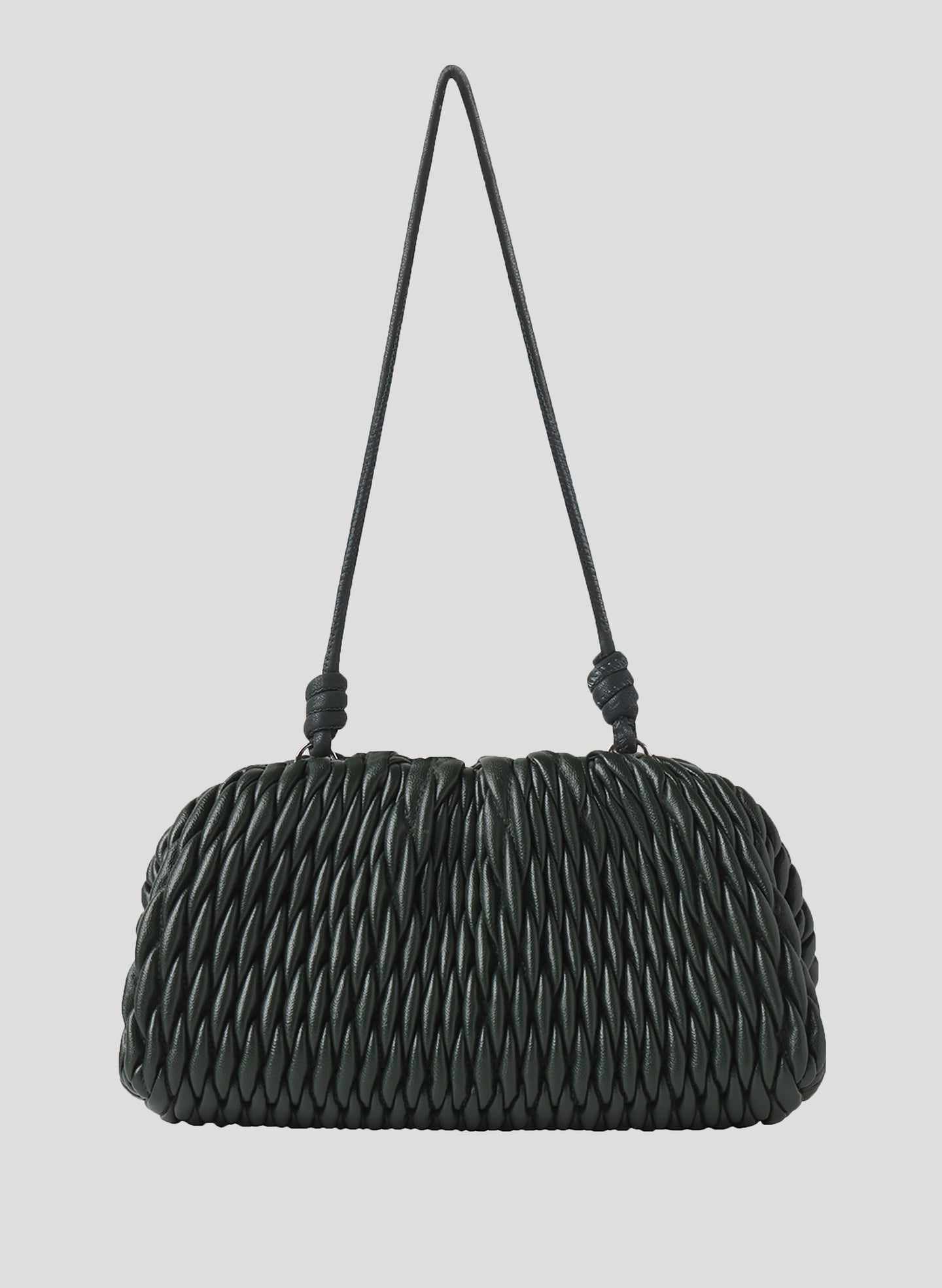 green quilted faux leather handbag