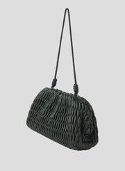 green handbag with strap