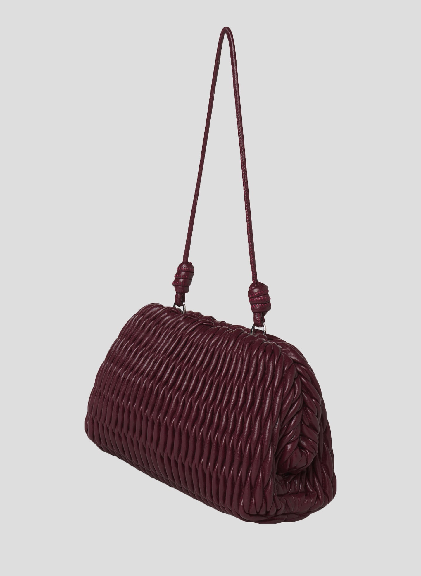 burgundy quilted faux leather handbag