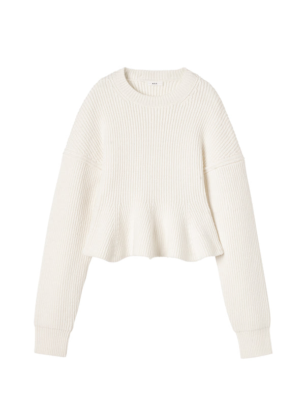 flatlay of white peplum sweater