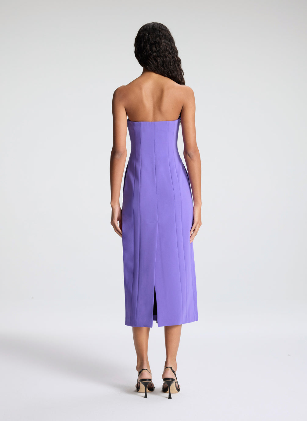 woman wearing purple strapless midi dress