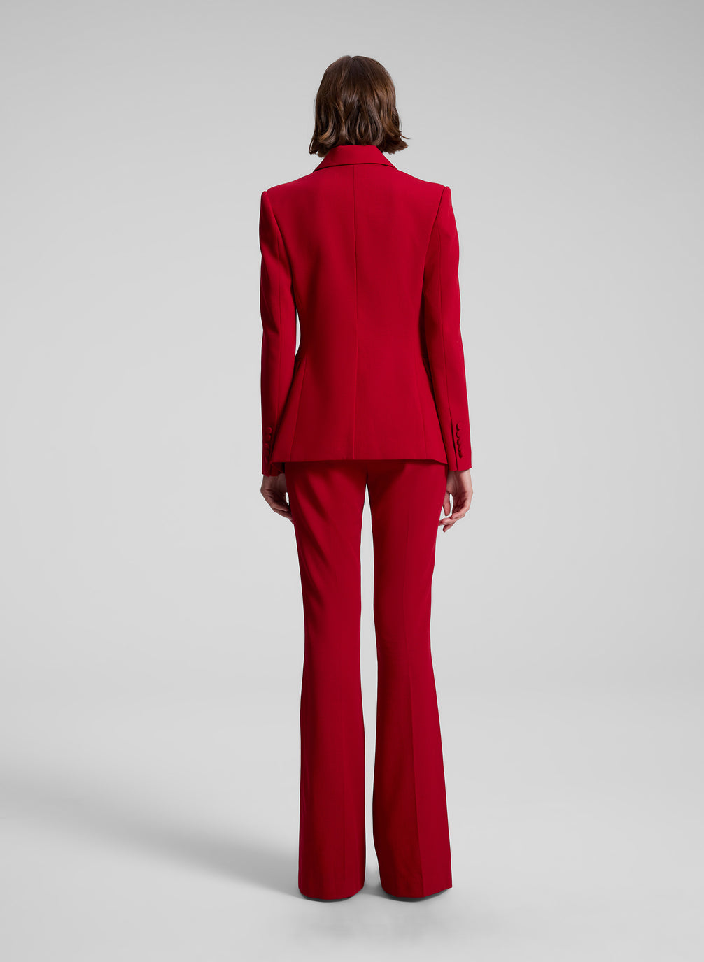 woman wearing red suit