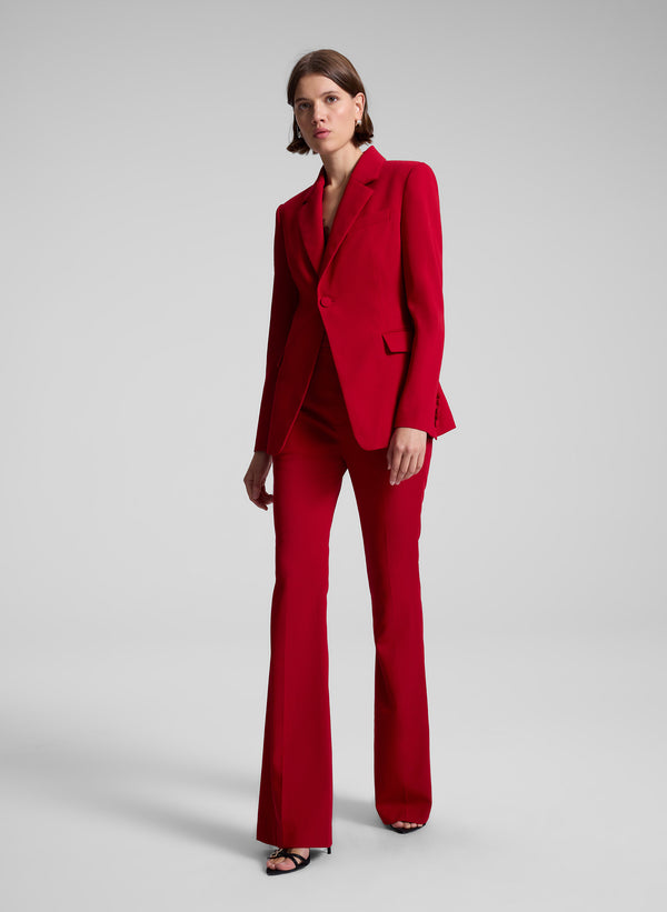 woman wearing red suit